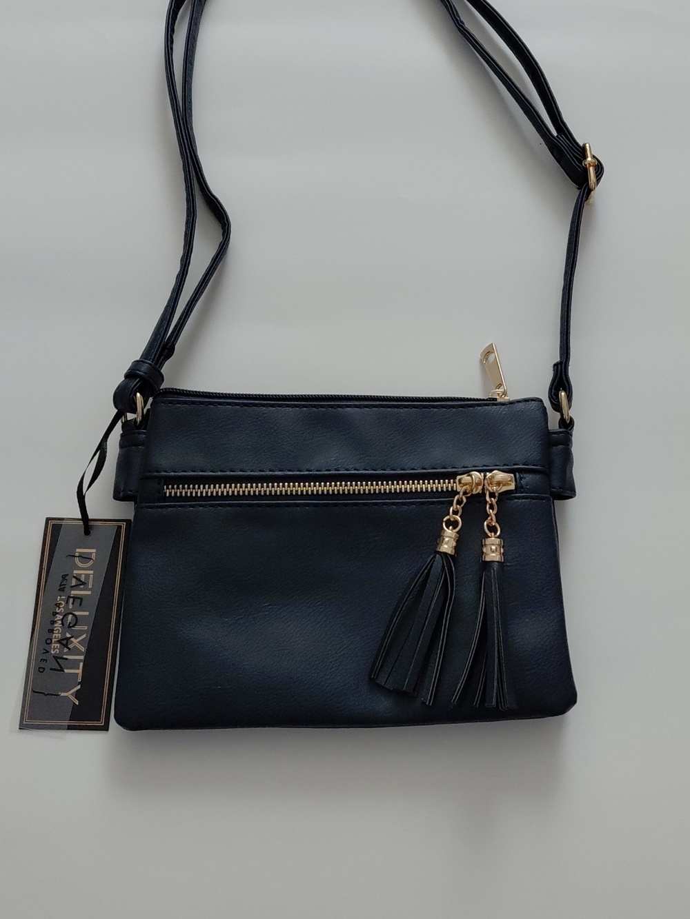Classic Black Crossbody Bag with Tassel Accent